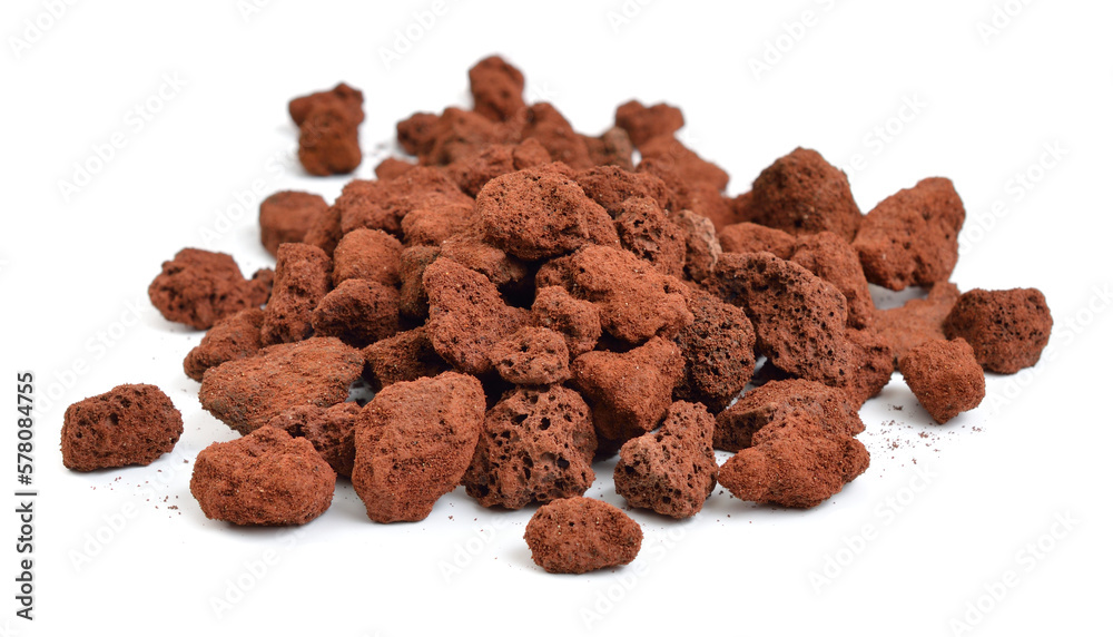 Porous brown volcanic rock isolated on white background. Lava stone, pumice stone Porous brown volcanic rock isolated on white background. Lava stone, pumice stone