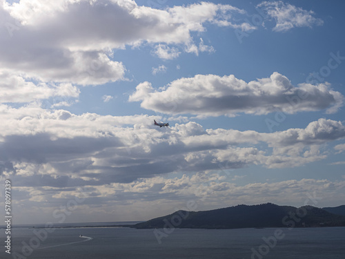 Passenger plane arriving on island