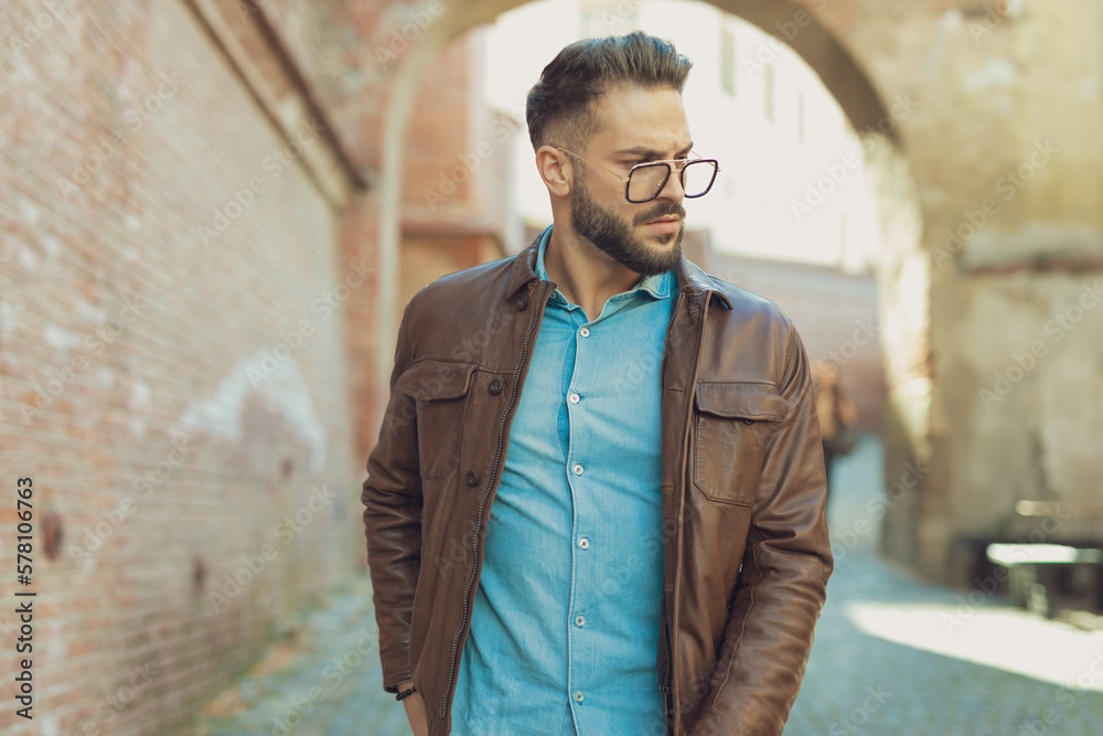 Fototapeta premium casual man posing with tough attitude