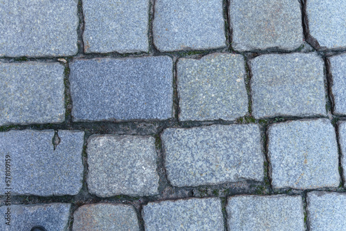 Abstract background of old cobblestone close up.