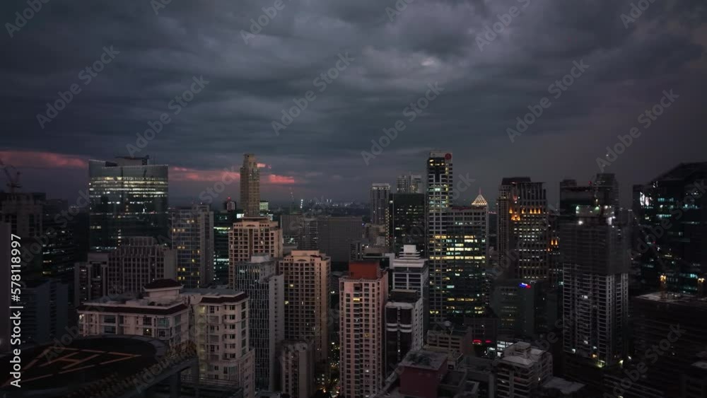 Flying Over The Evening Glowing Manila, Philippines, Aerial View Flying Over The Evening Glowing Manila, Philippines, Aerial View
