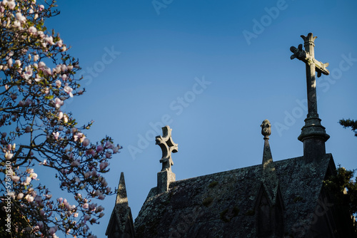 Photography The crosses of the ancient crypt against the blue sky.