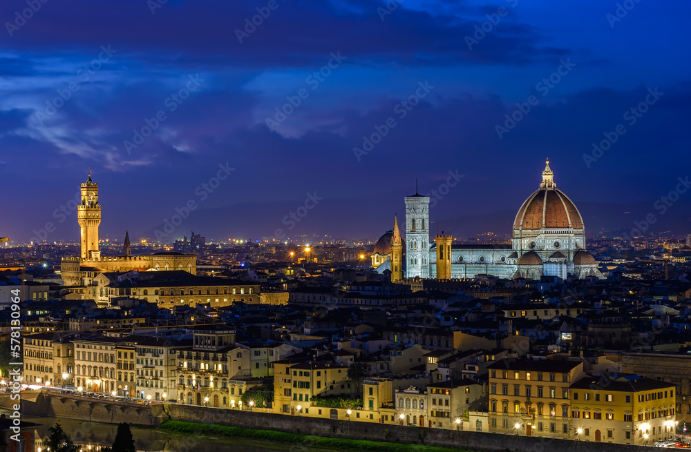 Night view of Florence, Palazzo Vecchio and Florence Duomo, Italy. Architecture and landmark of Florence. Night cityscape of Florence.
