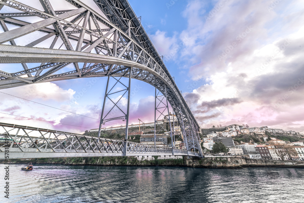 Fototapeta premium Cityscape. Openwork bridge over the Douro River in the city of Porto, Portugal, Nov.2019