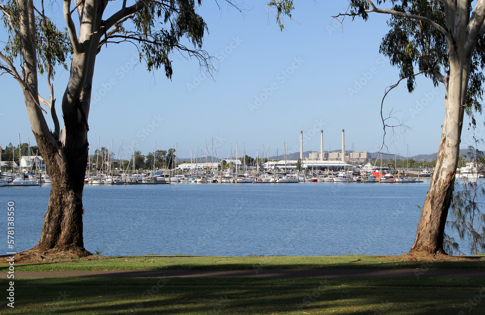 Fototapeta premium View of boats at the Gladstone Marina with the Power Station in the background in Queensland, Australia