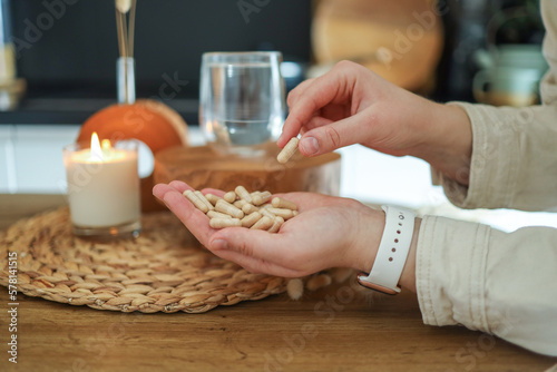 Woman, hand with vitamins and pills for medicine for depression, anxiety or mental health stress