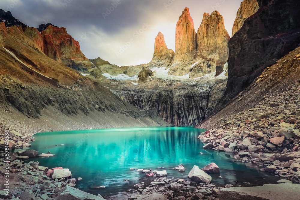 Torres Del Paine granites at sunrise and lake reflection, Chilean Patagonia
