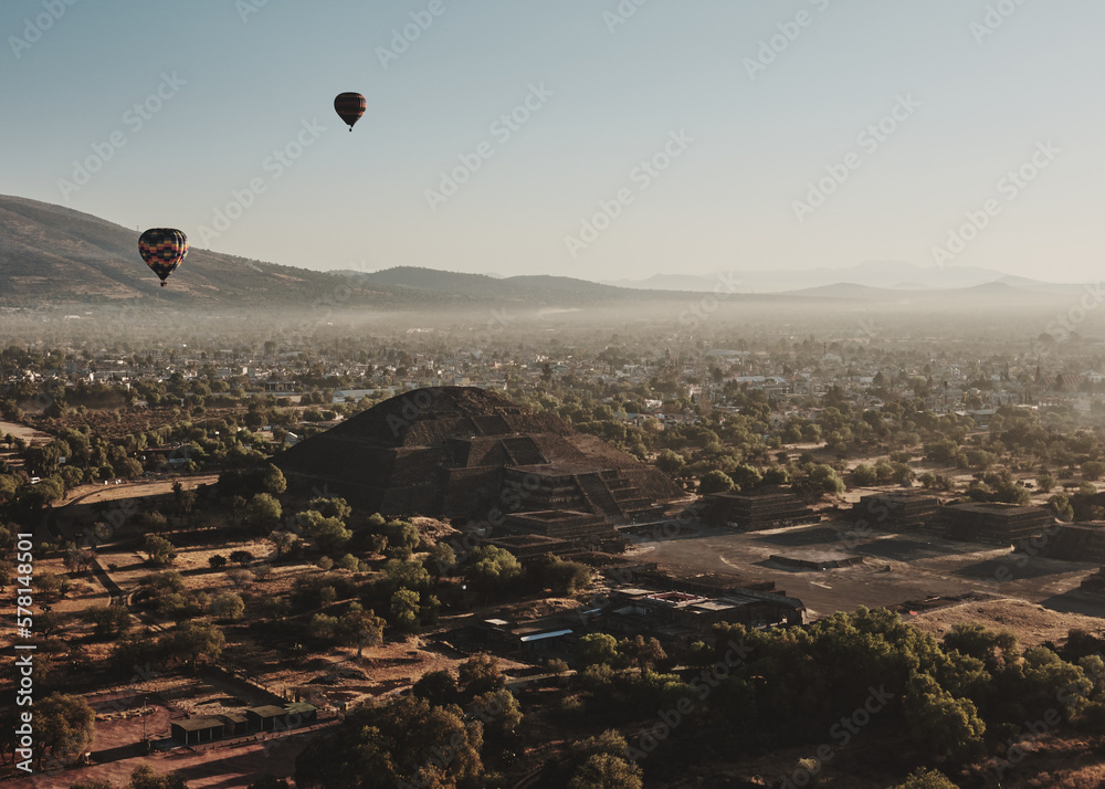 Sunrise hot air balloon flight over the ancient city of Teotihuacan and its pyramids in Mexico