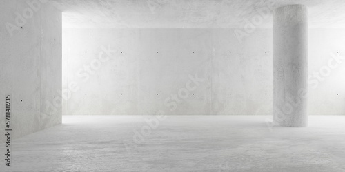 Abstract large, empty, modern concrete room with indirect light from the left, round pillar and rough floor - industrial interior background template