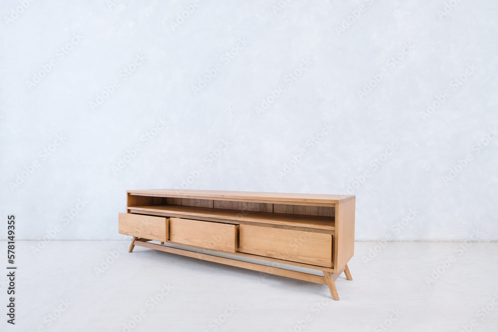 Teak wood television table on a white background