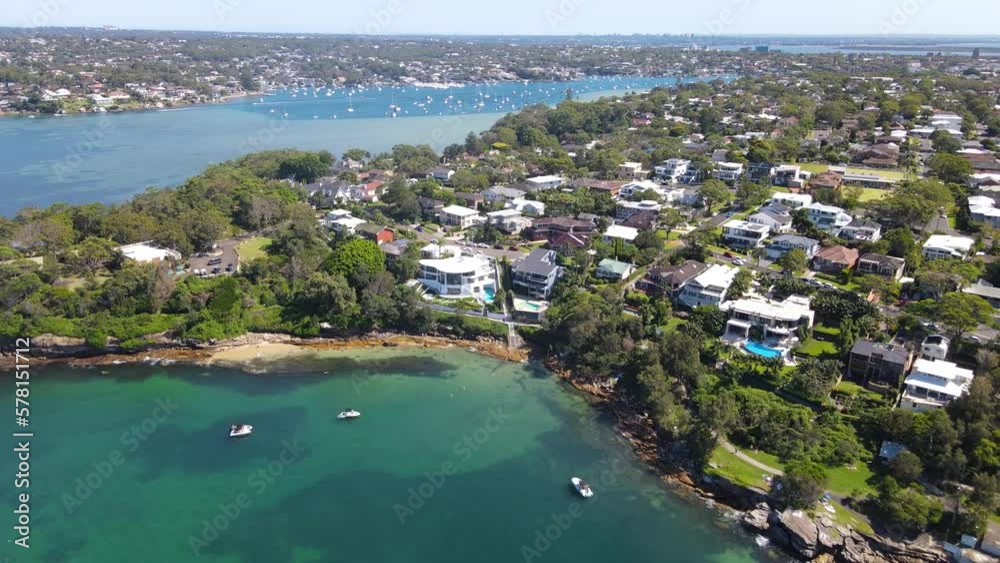 Aerial drone pullback reverse view of Cronulla Peninsula on the Port Hacking in the Sutherland Shire, Sydney NSW Australia looking toward Burraneer during summer on a sunny day
