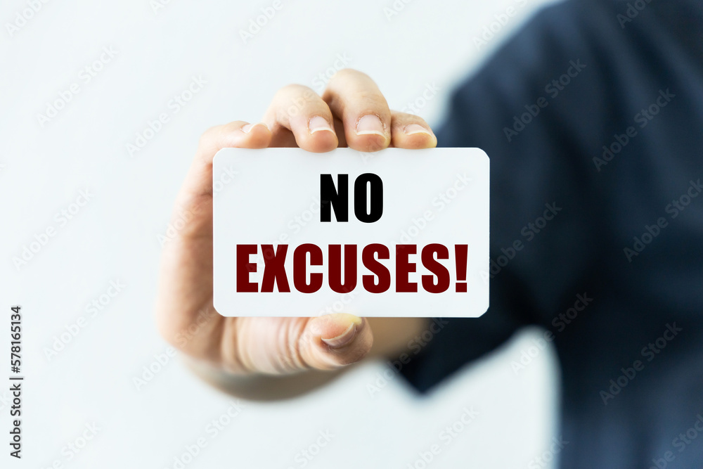 No excuses on blank business card being held by a woman's hand with blurred background. Business concept to inform audience about no excuses. No excuses on blank business card being held by a woman's hand with blurred background. Business concept to inform audience about no excuses.