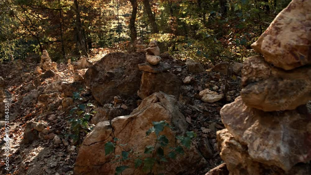 A bunch of rocks stacked in an autumn forest A bunch of rocks stacked in an autumn forest