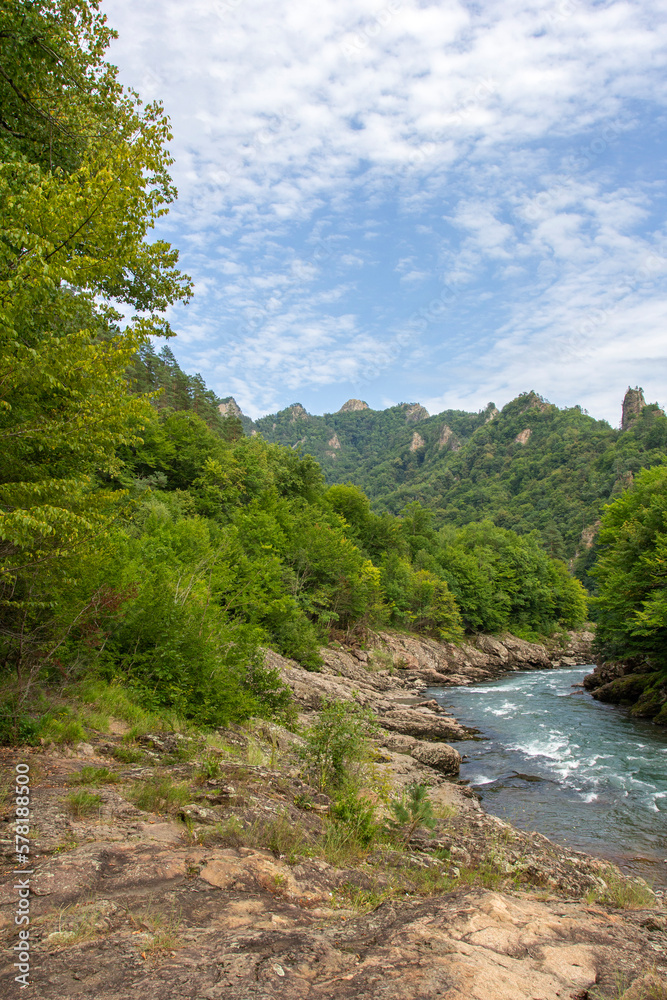 Summer, river, mountainous terrain, tourist routes running through the park, a place for walking and recreation. Summer, river, mountainous terrain, tourist routes running through the park, a place for walking and recreation.