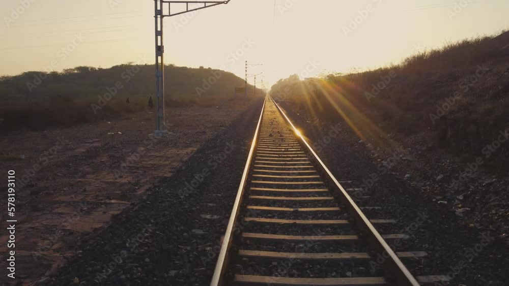 POV of a Train Running on Rail tracks in India at Golden hour