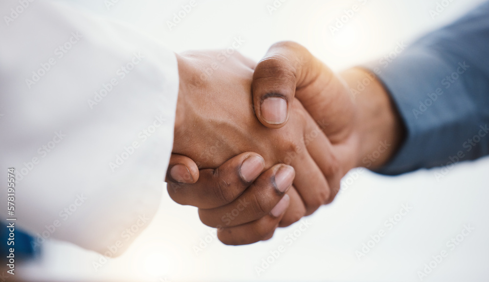 Fototapeta premium Health, closeup and handshake for partnership, motivation and success with agreement, collaboration and greeting. Zoom, hands and people with teamwork, congratulations and consultation in hospital