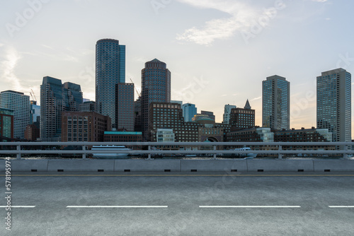 Empty urban asphalt road exterior with city buildings background. New modern highway concrete construction. Concept of way to success. Transportation logistic industry fast delivery. Boston. USA. © VideoFlow