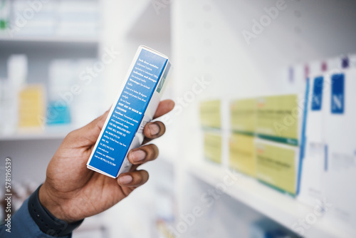 Fototapeta Naklejka Na Ścianę i Meble -  Pharmacy, medicine and pills, man and box in hand, healthcare and prescription medication in drug store. Medical, closeup and pharmaceutical product for health, wellness and treatment with pharmacist