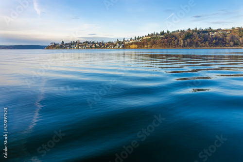 View from the ocean to expensive houses, Tacoma neighborhood, Seattle. Sunset