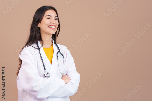Friendly caucasian female doctor in uniform and stethoscope
