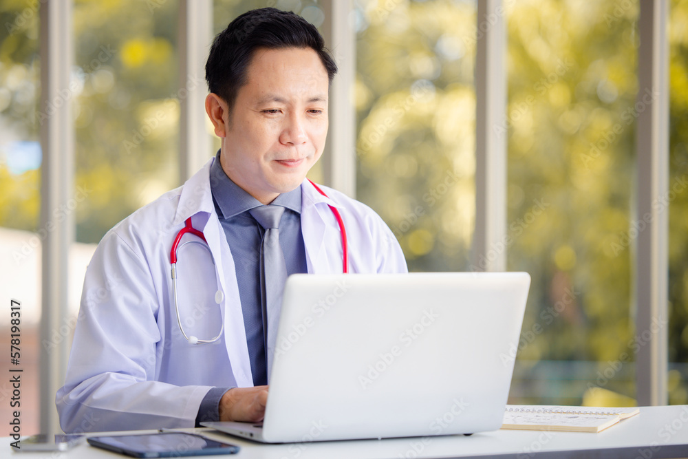 Doctor using online health consulting on computer pc and digital tablet, Tele medical healthcare concept Doctor using online health consulting on computer pc and digital tablet, Tele medical healthcare concept
