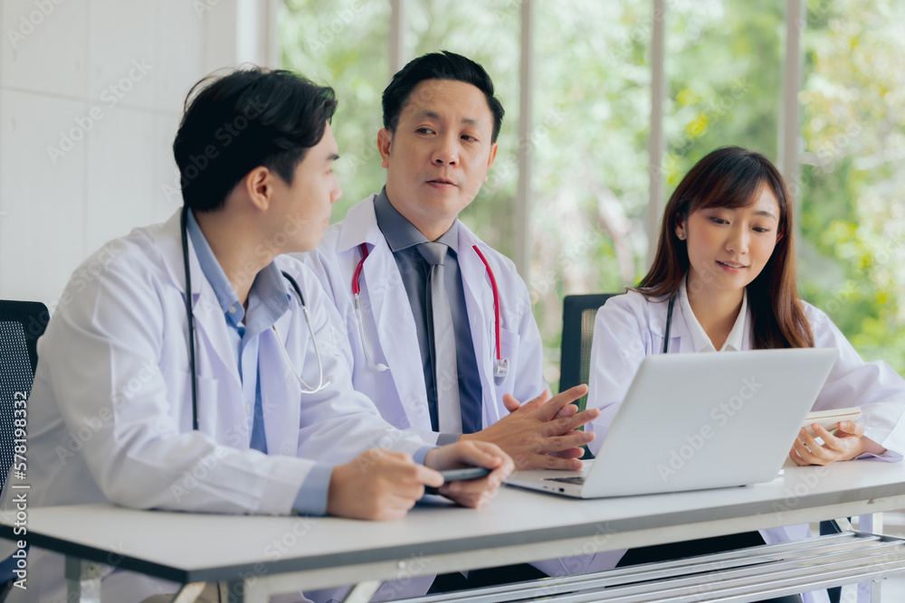 Group of asian professional doctor working or meeting together at hospital office Group of asian professional doctor working or meeting together at hospital office