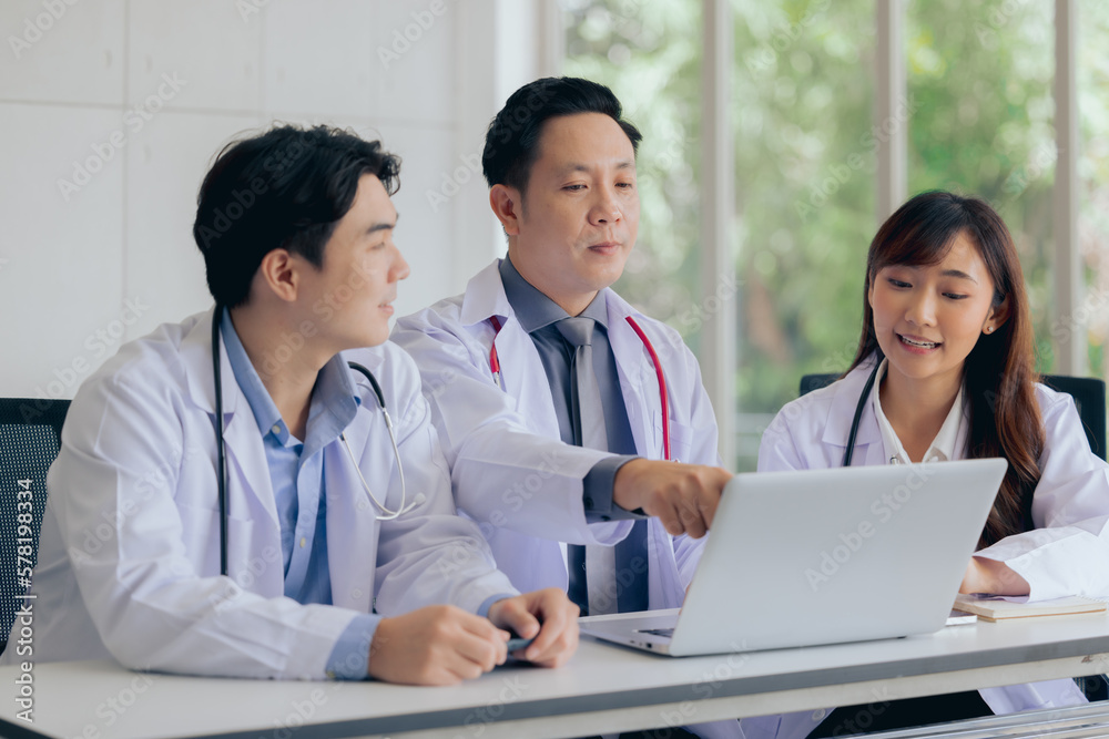 Group of asian professional doctor working or meeting together at hospital office Group of asian professional doctor working or meeting together at hospital office