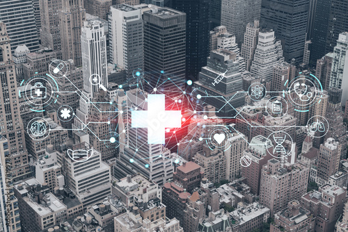 Aerial birds eye panoramic city view of Upper Manhattan area and East Side neighborhoods  New York city  USA. Health care digital medicine hologram. The concept of treatment and disease prevention