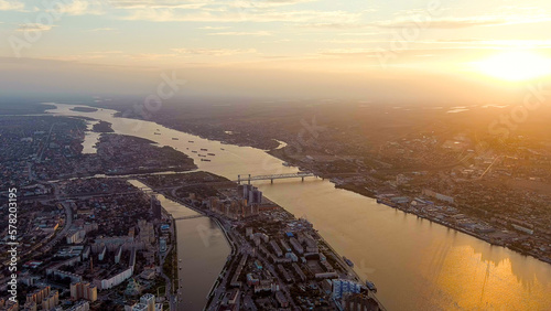 Astrakhan, Russia. View of the city during sunset. Volga river. Old bridge, Aerial View