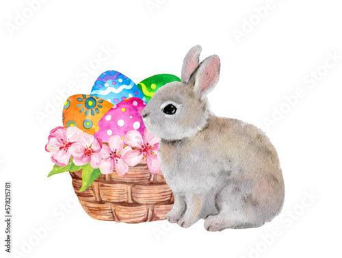 Cute little Easter bunny with basket with colored eggs and cherry blossom flowers. Watercolor small character rabbit beautiful design 
