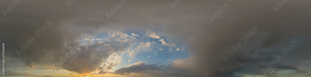 Obraz premium Dramatic sunset sky panorama with Cumulus clouds. Seamless hdr 360 pano in spherical equirectangular format. Complete zenith for 3D visualization, game and sky replacement for aerial drone panoramas