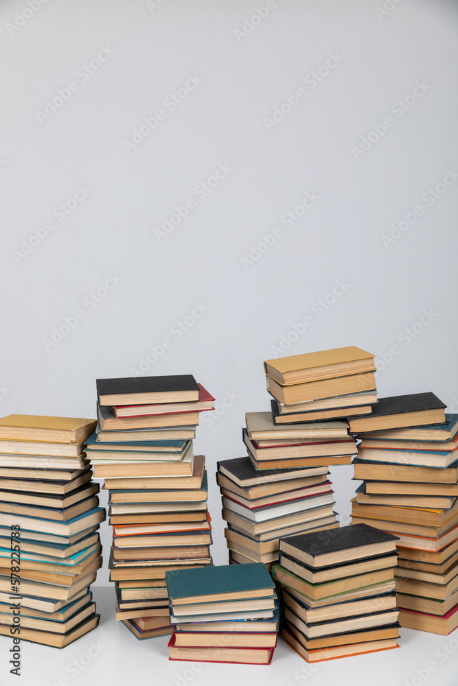 science reading a lot of books on a white background in the library in the knowledge room science reading a lot of books on a white background in the library in the knowledge room