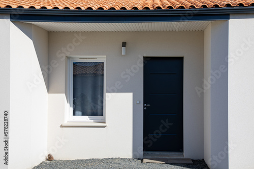 modern new house facade front door entrance of home building