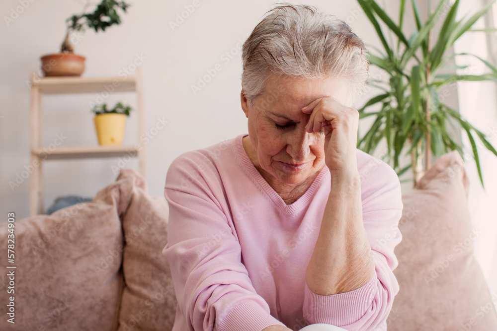 middle aged lady looking away sit alone at home feel anxious lonely, sad middle aged lady looking away sit alone at home feel anxious lonely, sad