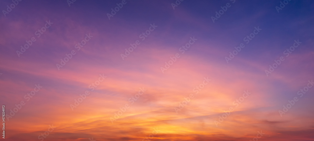 Photos of twilight sky before sunrise or after sunset, clouds fill the sky, panorama  image. orange tones, natural phenomenon background.