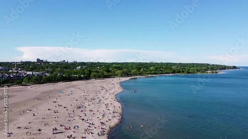 Wallpaper Mural Flying over busy Toronto beach on Lake Ontario. Torontodigital.ca