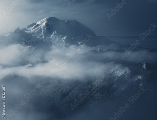 Mount Rainier surrounded by mist in winter
