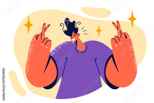 Superstitious man crosses fingers of two hands to make cherished wish and attract fortune
