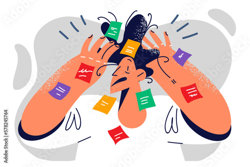 Man with stickers on hands and face fail deadlines due to overload and lack professionalism