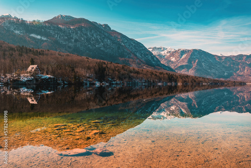 Scenic view of lake Bohinj, large body of glacial body of water in Slovenian national park Triglav in cold february morning
