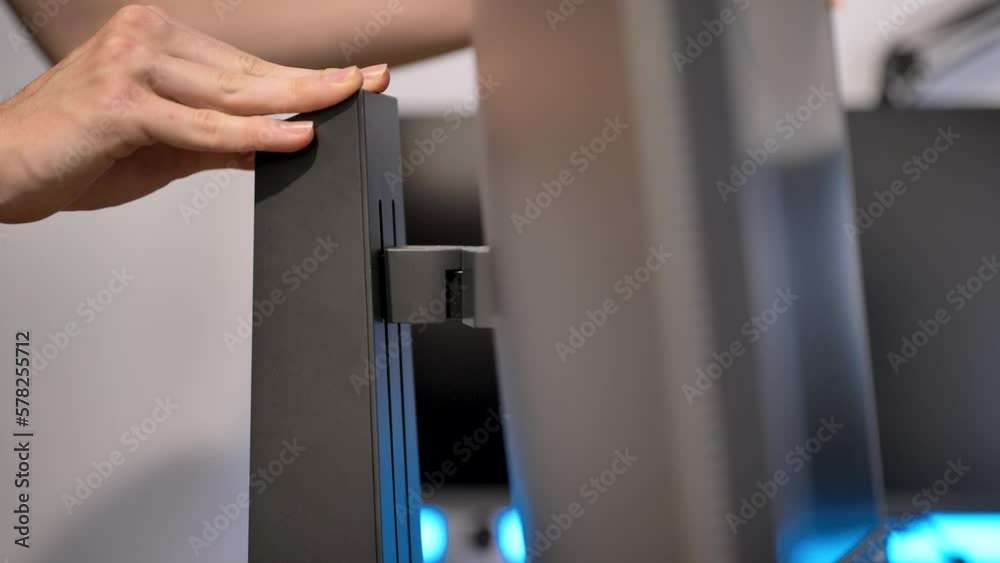 Computer Monitor is adjusted left and right slowly.