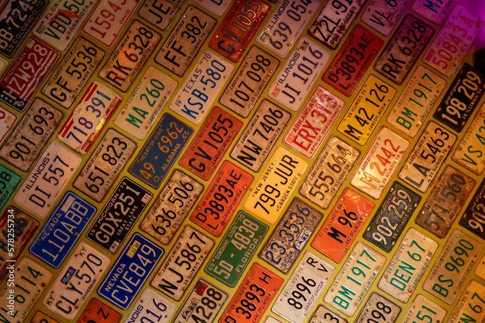 one wall is completely covered with old american license plates