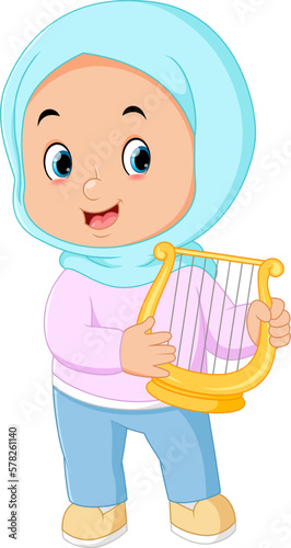 a Muslim girl is happy playing the music harp