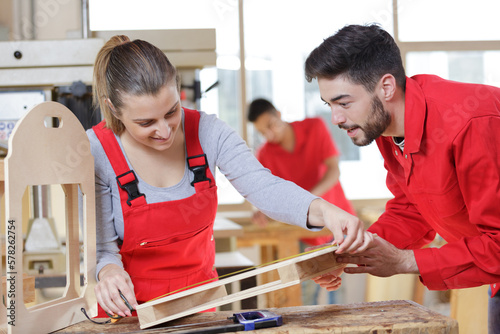 young-adult students in carpentry class