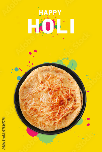 Assorted Indian Holi festival food like puranpoli, gujiya, Jalebi on colorful background and colors with copy space. Happy holi food banner. Festival of colors.  photo