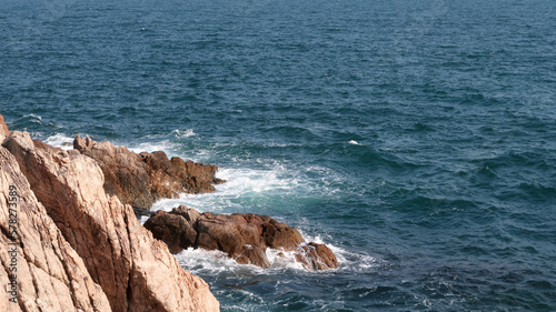 waves crashing on rocks