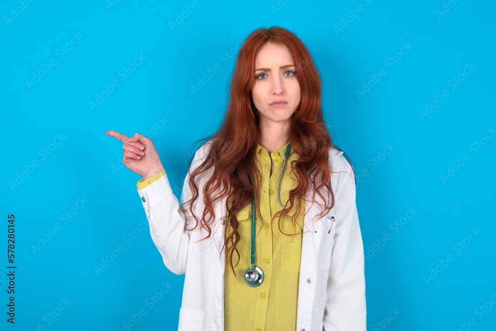 Serious MODEL smirks face points away on copy space shows something unpleasant. Look at this advertisement. Big price concept Serious MODEL smirks face points away on copy space shows something unpleasant. Look at this advertisement. Big price concept
