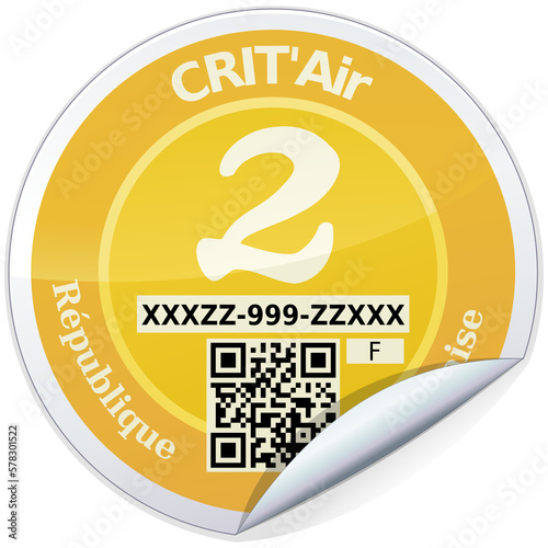 Rounded sticker of a category 2 yellow crit'air label, classification of fine particle emissions from vehicles in France (isolated)