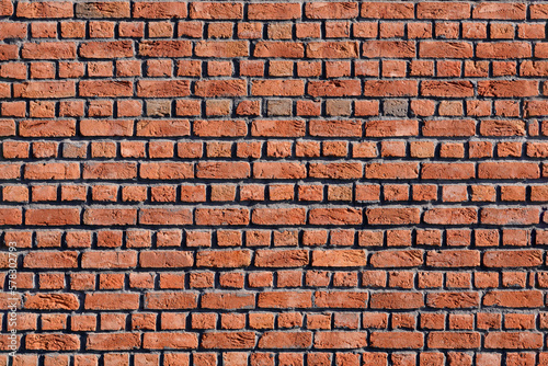 Old red brick wall background. Masonry wall, stonework