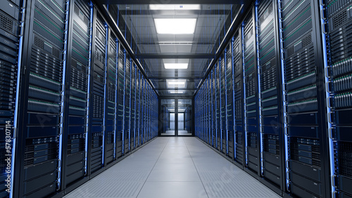 Inside Large Data Center. Advanced Cloud Computing Concept. Corridor with Server Racks and Cabinets full of Hard Drives
